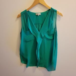 Green sheer sleeveless Babaton blouse